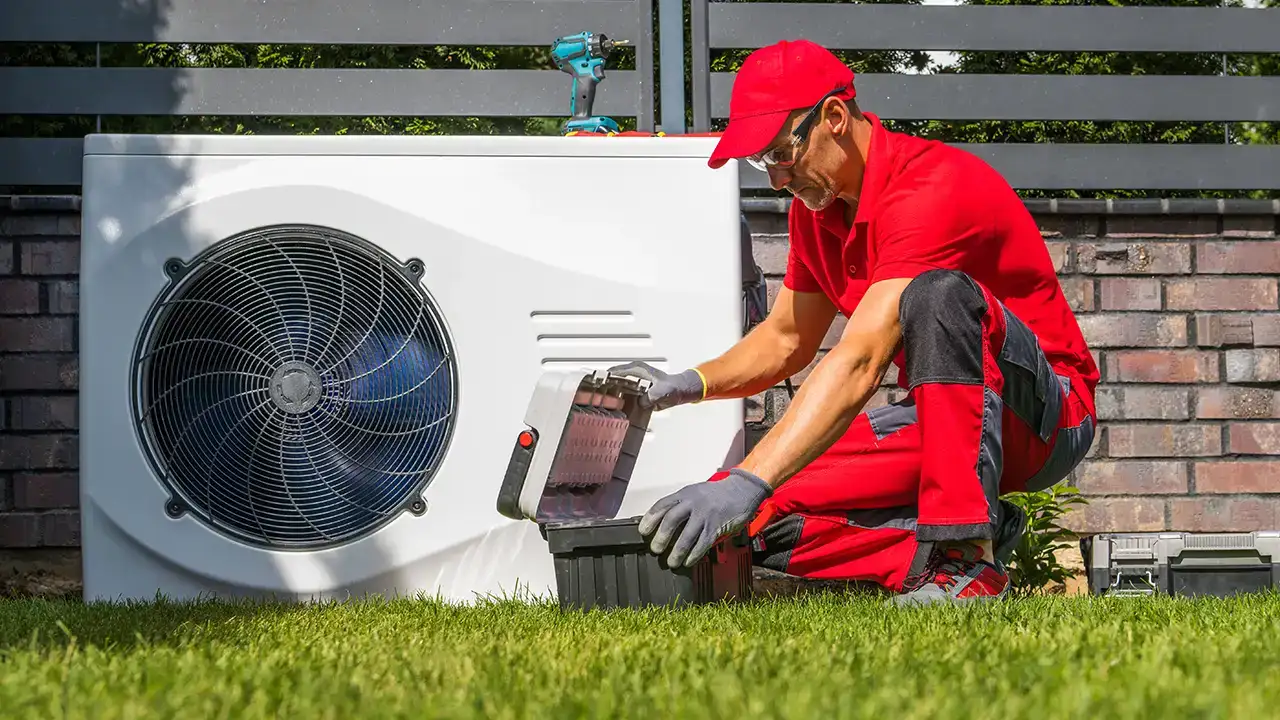 HVAC installer installing outdoor mini split heat pump unit | HVAC Installation Near Me | Fairhope HVAC Repair