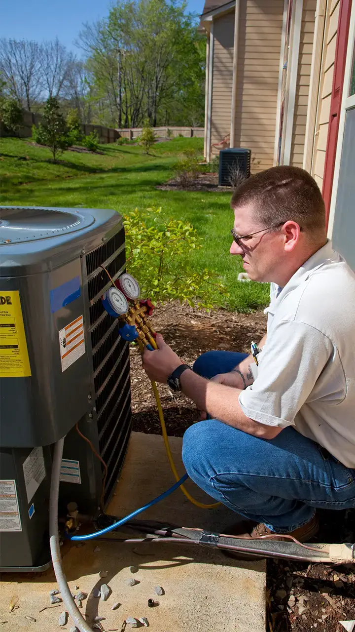 Fairhope HVAC Repair technician performing air conditioning repair on outdoor unit | Air Conditioning Repair | Fairhope HVAC Repair
